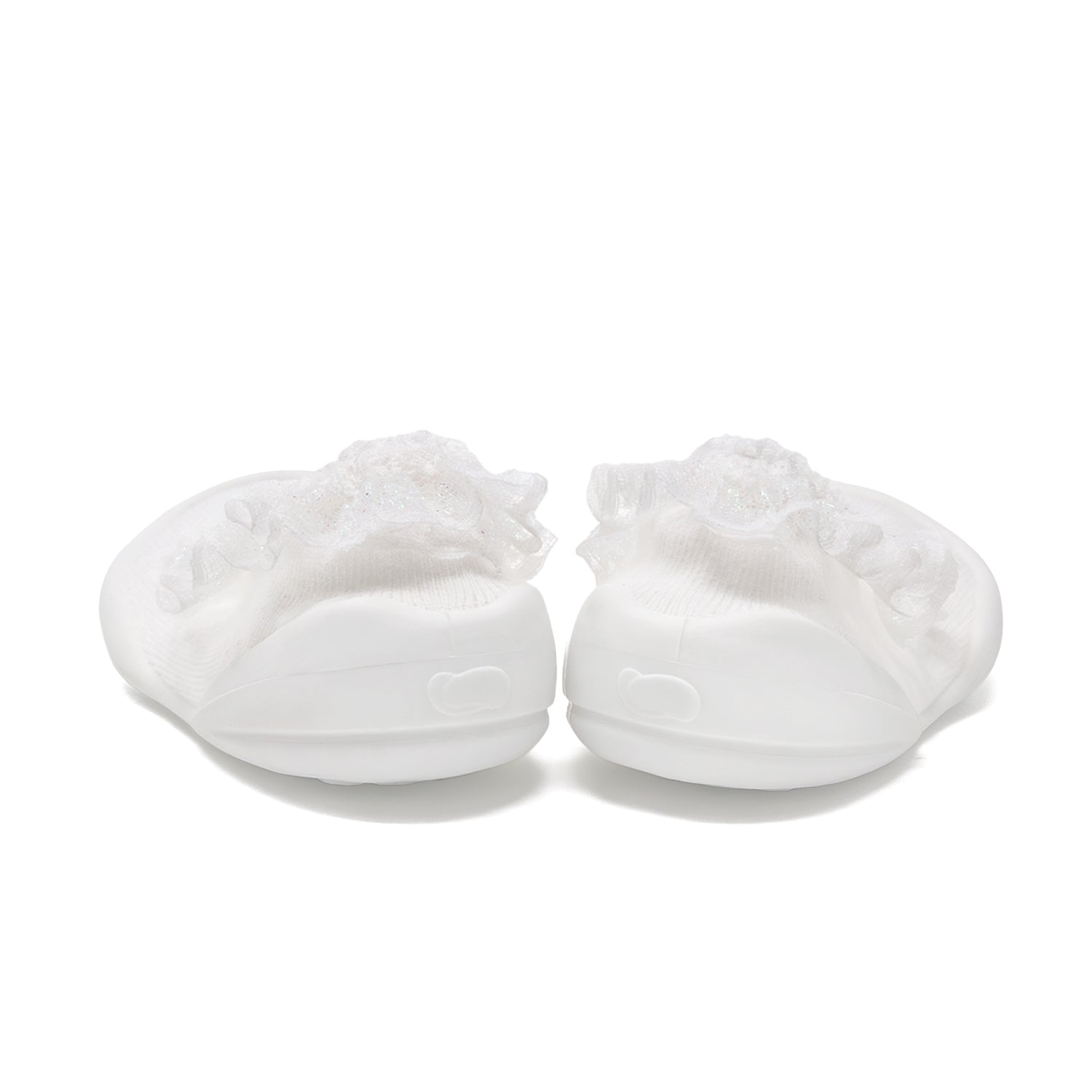 Pair of white baby shoes.