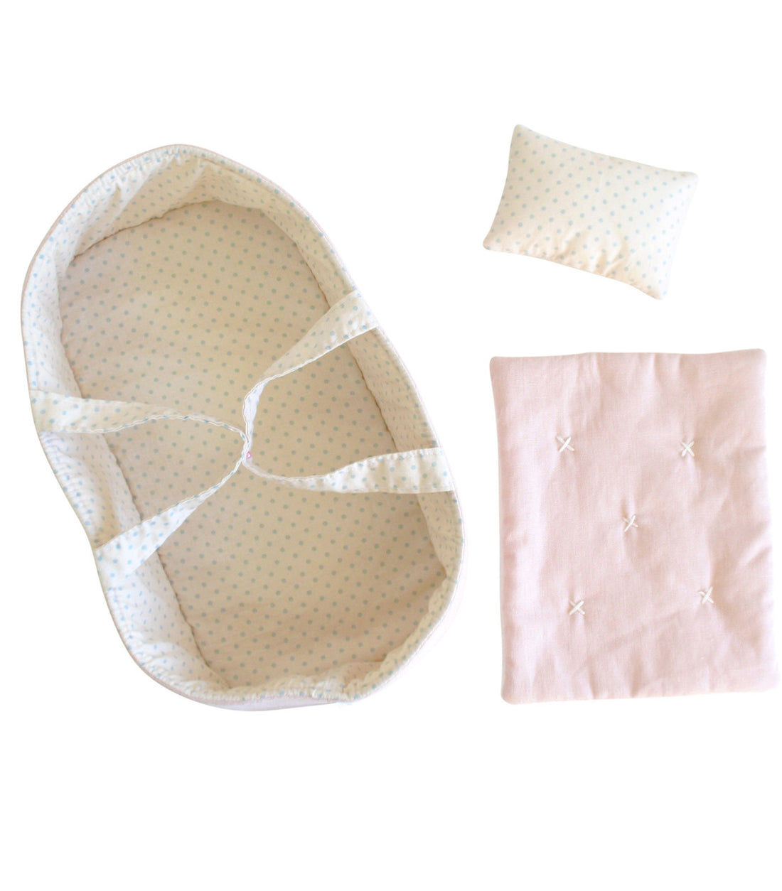 Doll bed set with baby blanket and pillow.
