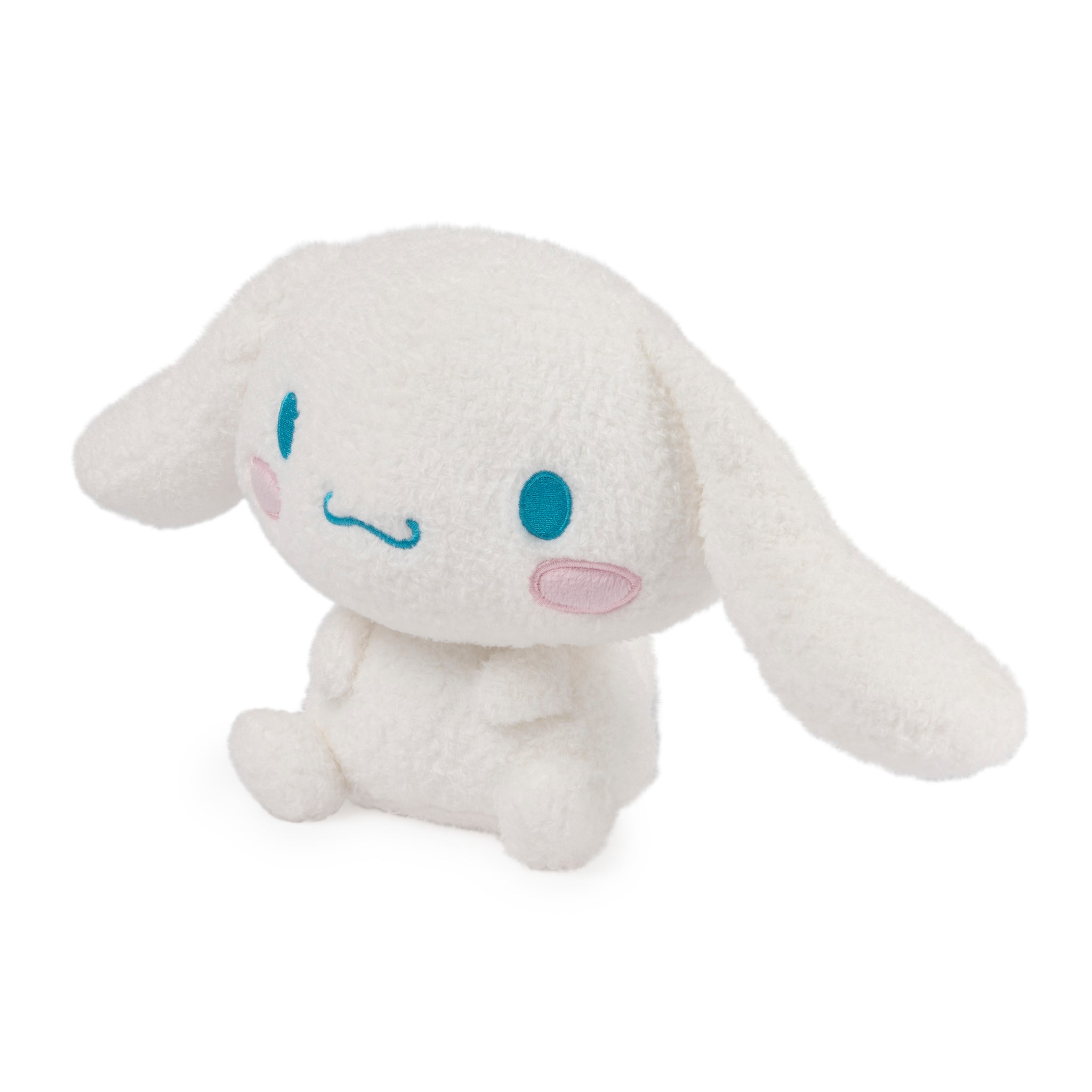 White plush Cinnamoroll toy sitting.