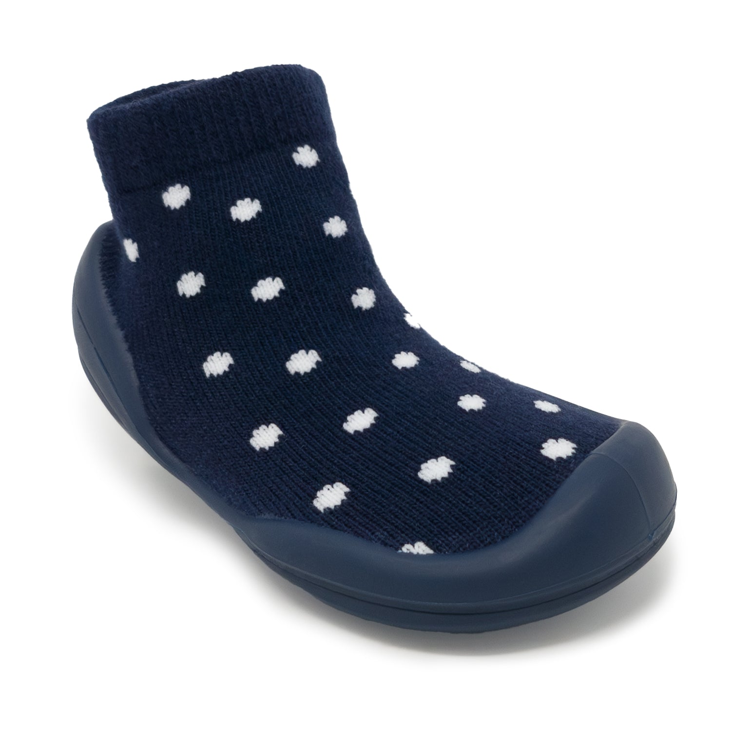 Navy slipper with white polka dots on a white background