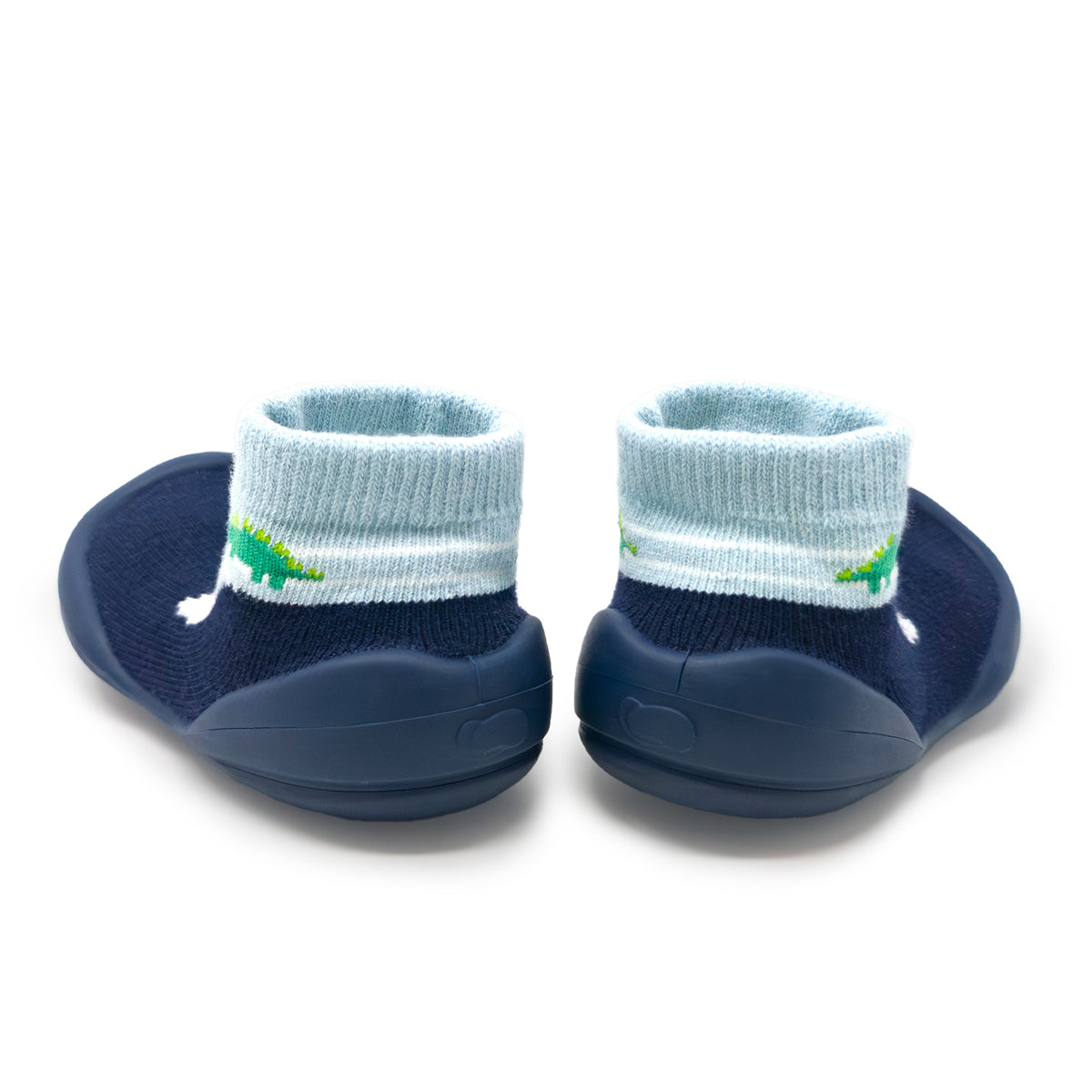 Two navy blue baby shoes with light blue ribbed socks.