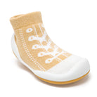 Beige and white sock shoe.
