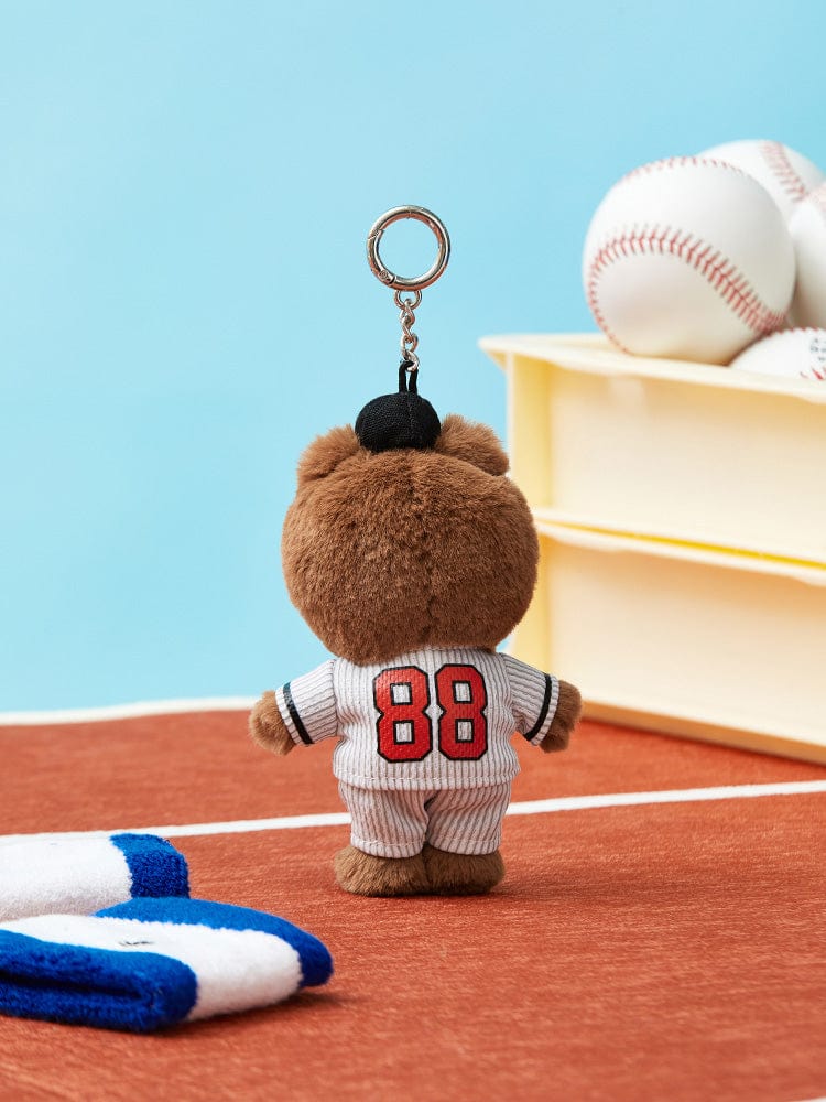 Brown bear plush keychain wearing baseball uniform with "88" on the back.
