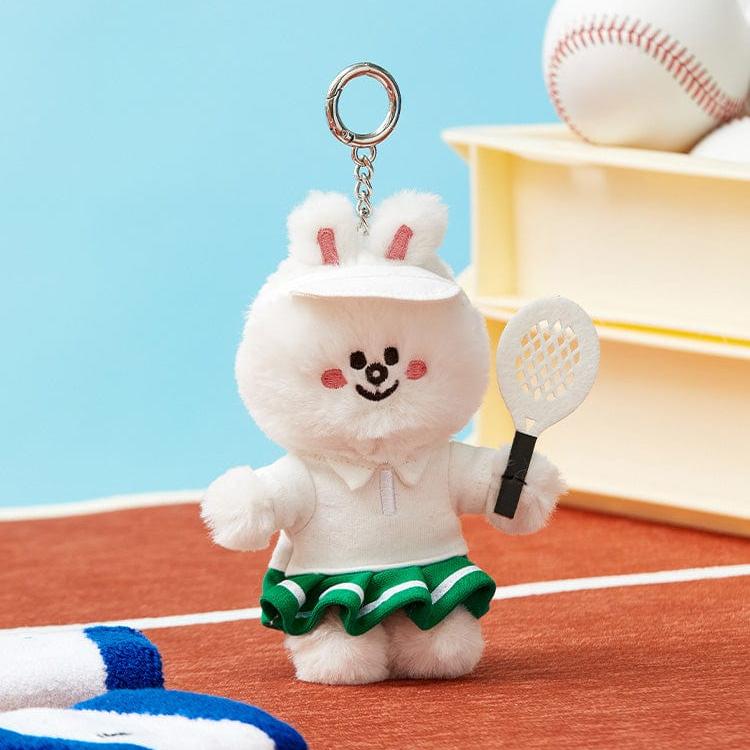 White rabbit plush toy in tennis outfit.