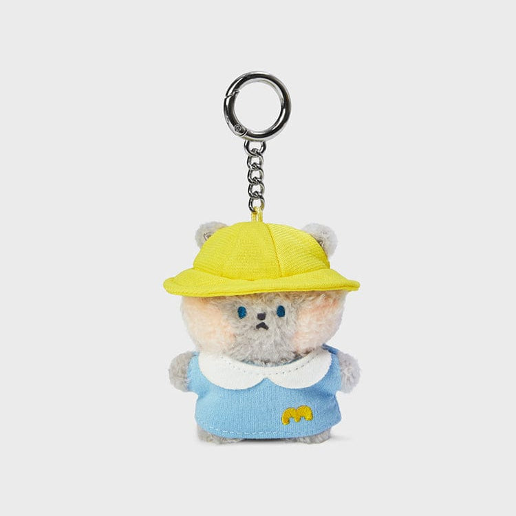 Plush gray bear keychain wearing a yellow hat and blue outfit.
