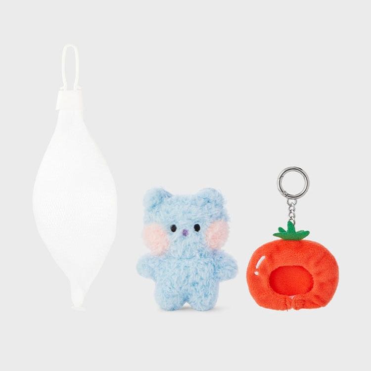 Three products: a white mesh bag, a blue teddy bear, and an orange tomato keychain.