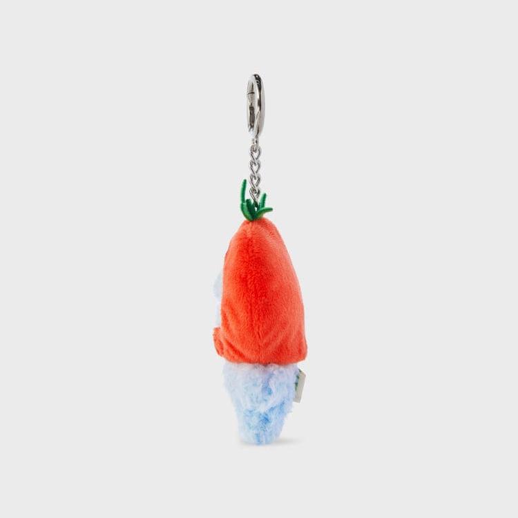 Side view of an orange and blue plush key chain.