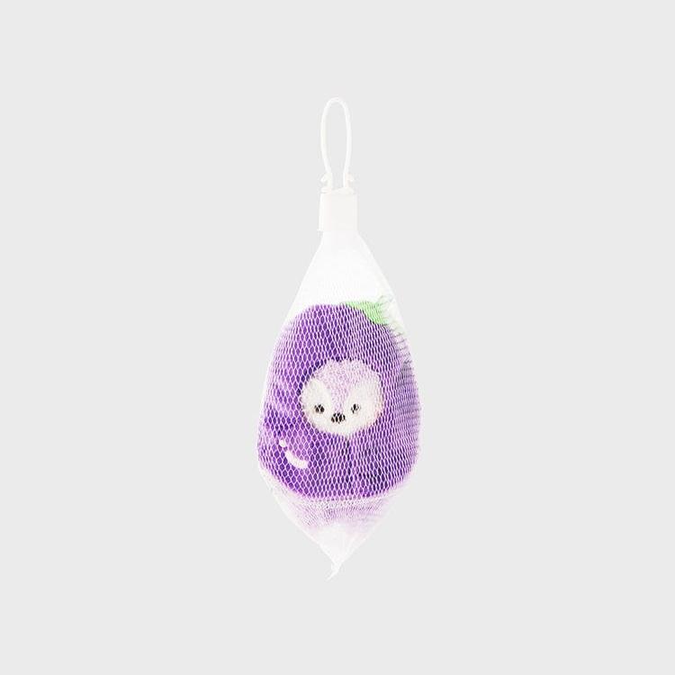 Purple plush toy in a white mesh bag.