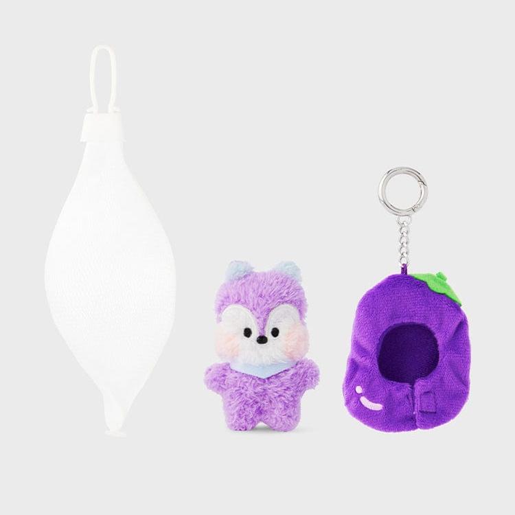Three plush toys on a gray background. A white mesh drawstring bag, a purple plush squirrel with a blue scarf, and a purple plush eggplant-shaped key chain with a silver keyring.