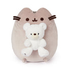 Pusheen plush toy with a white teddy bear.