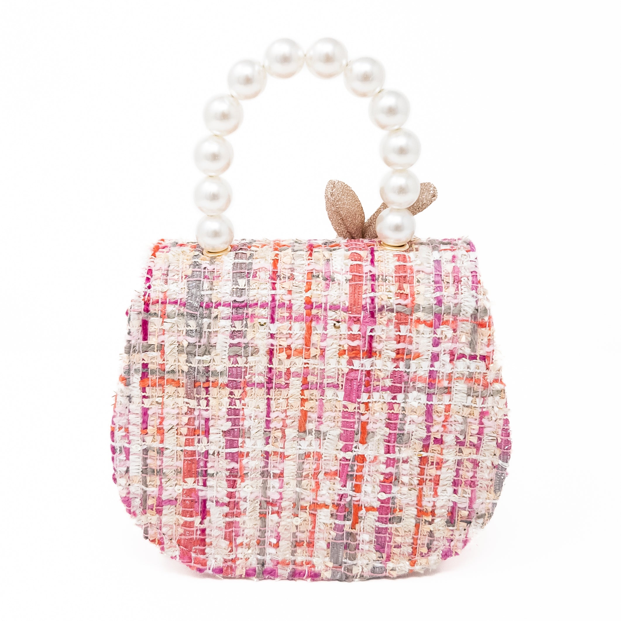 Tweed handbag with pearl handle and gold bow accent.