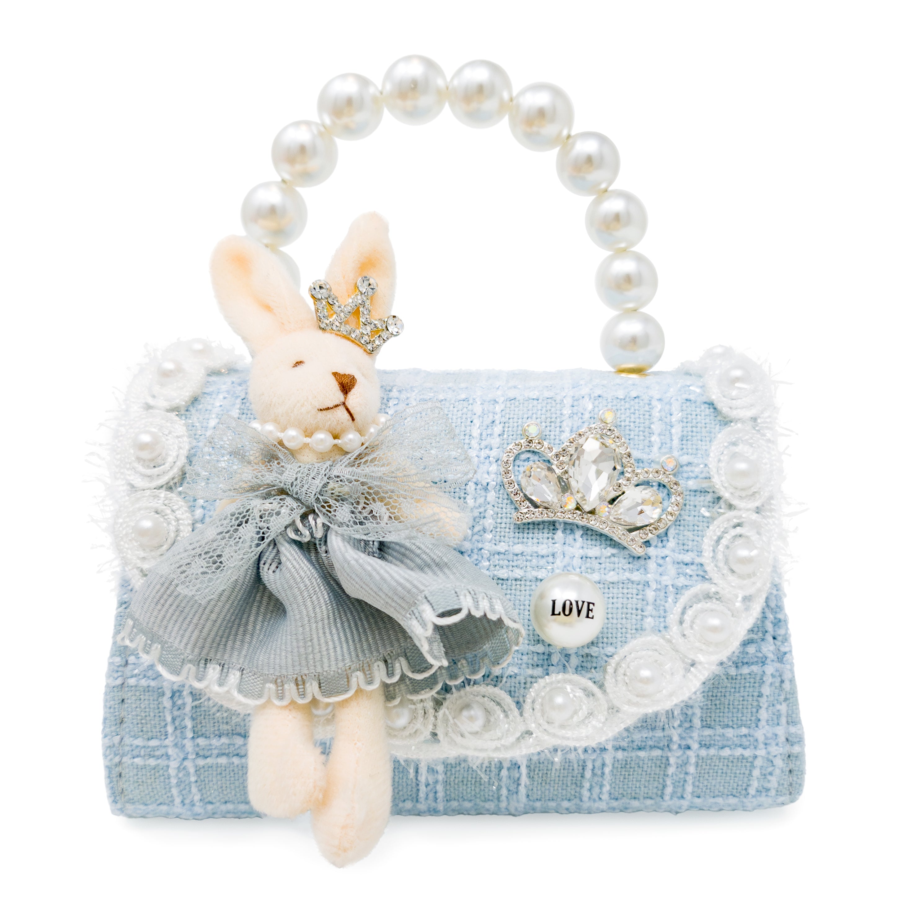 Decorative handbag with a rabbit figure, pearl handle, and decorative elements on a white background