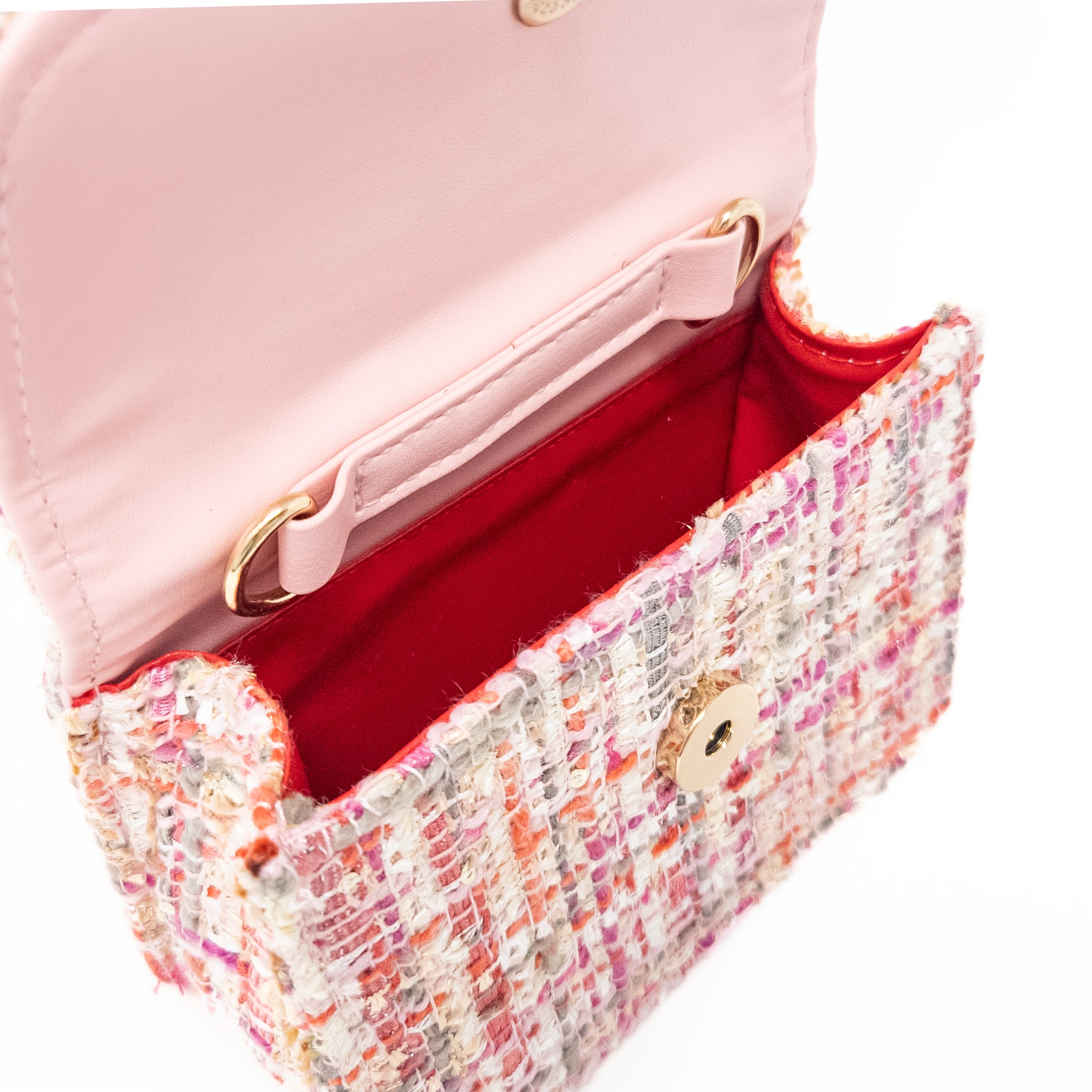 Open pink tweed handbag.