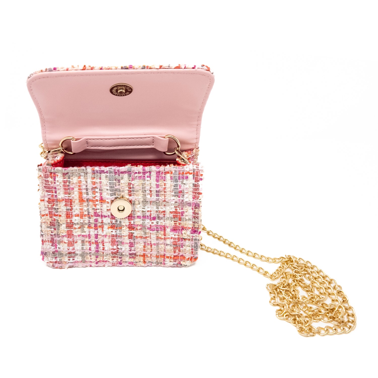 Open, pink and multicolor tweed purse with a gold chain.