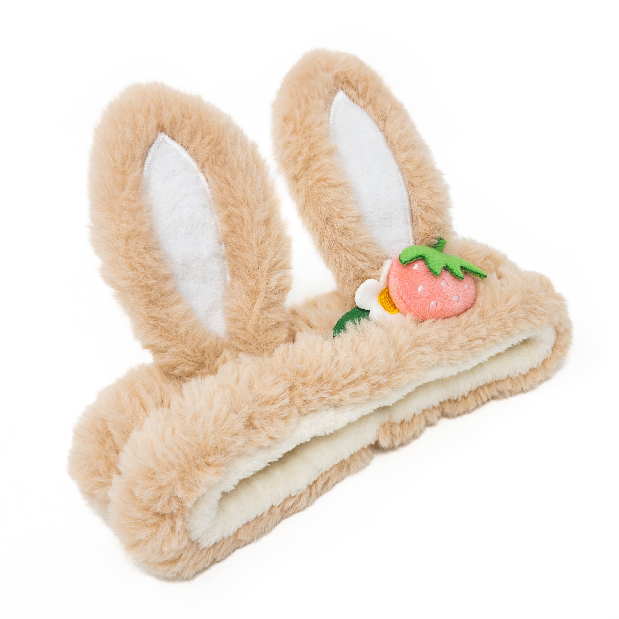 Fuzzy bunny ear headband with strawberry accent.