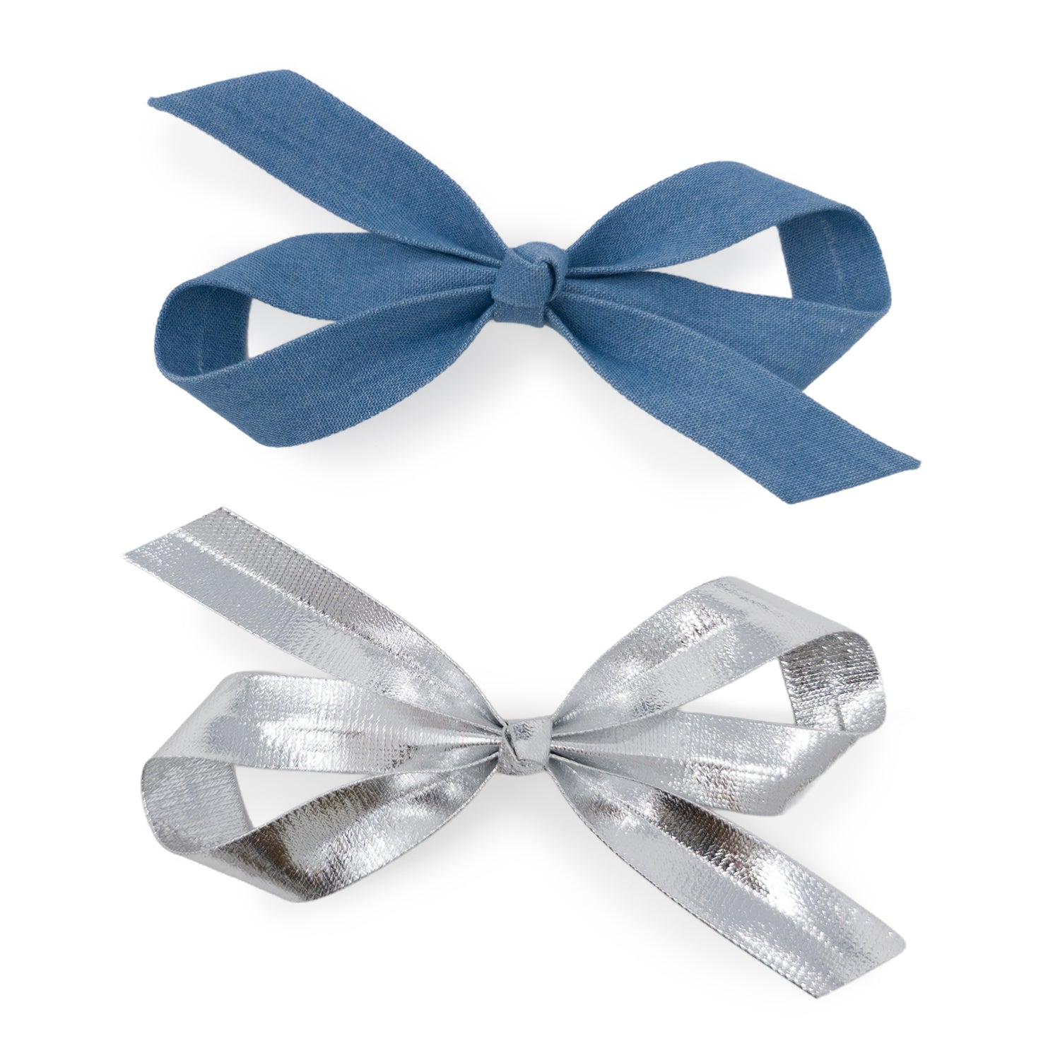 Light denim and silver bow clip set with one blue fabric and one metallic silver bow.