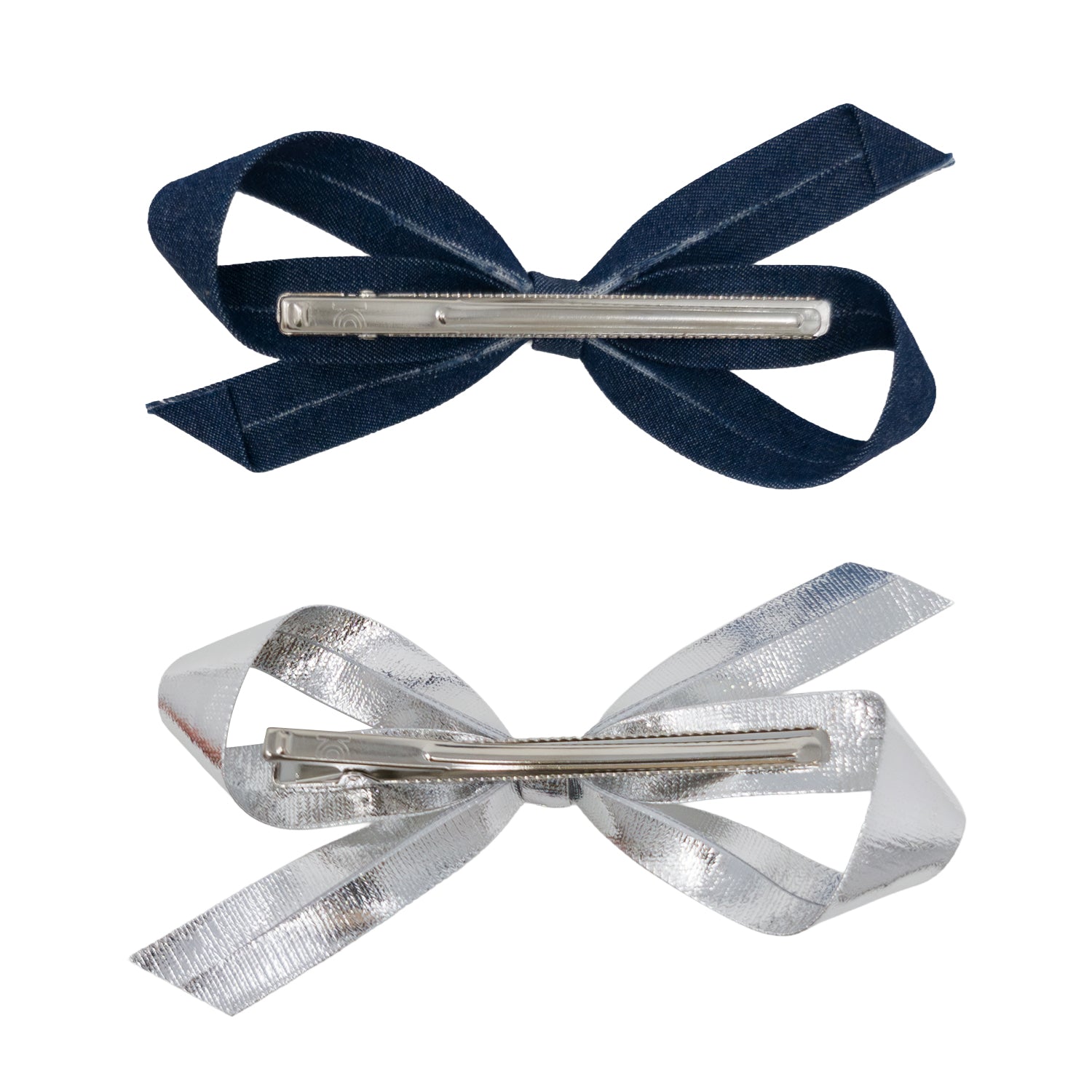Bow clip set with two bows, one light denim and one silver, seen from the back with alligator clips.