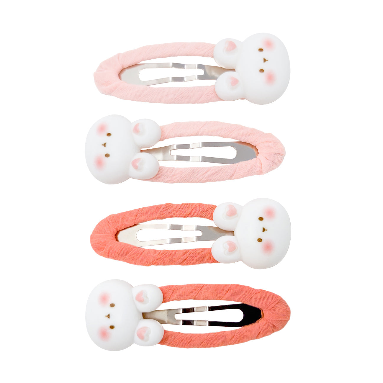 Four hair clips with white rabbit heads. Each clip has a different pastel color.