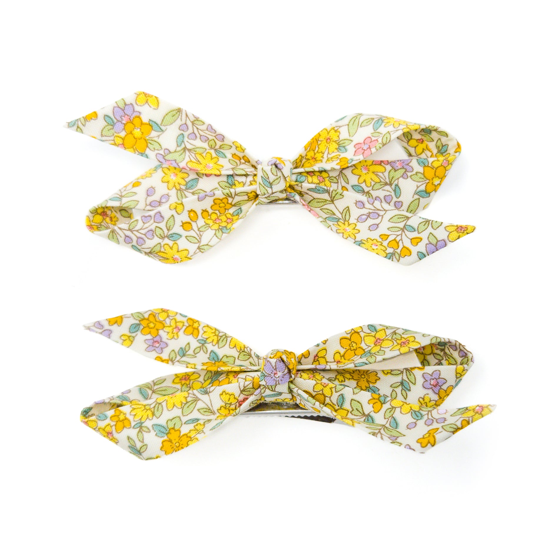 Two floral print hair clips.