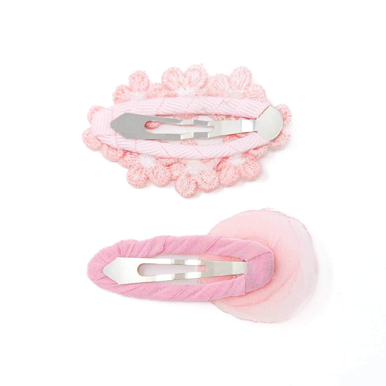 Two pink hair clips with silver metal clips.