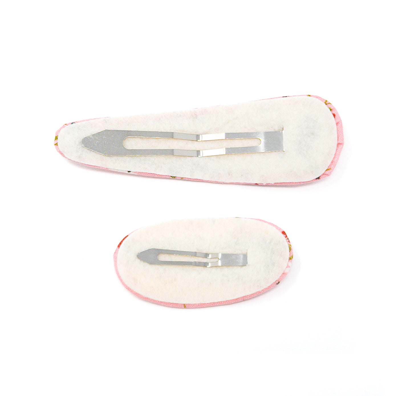 Two floral hair clips with metal clasps on a white background.