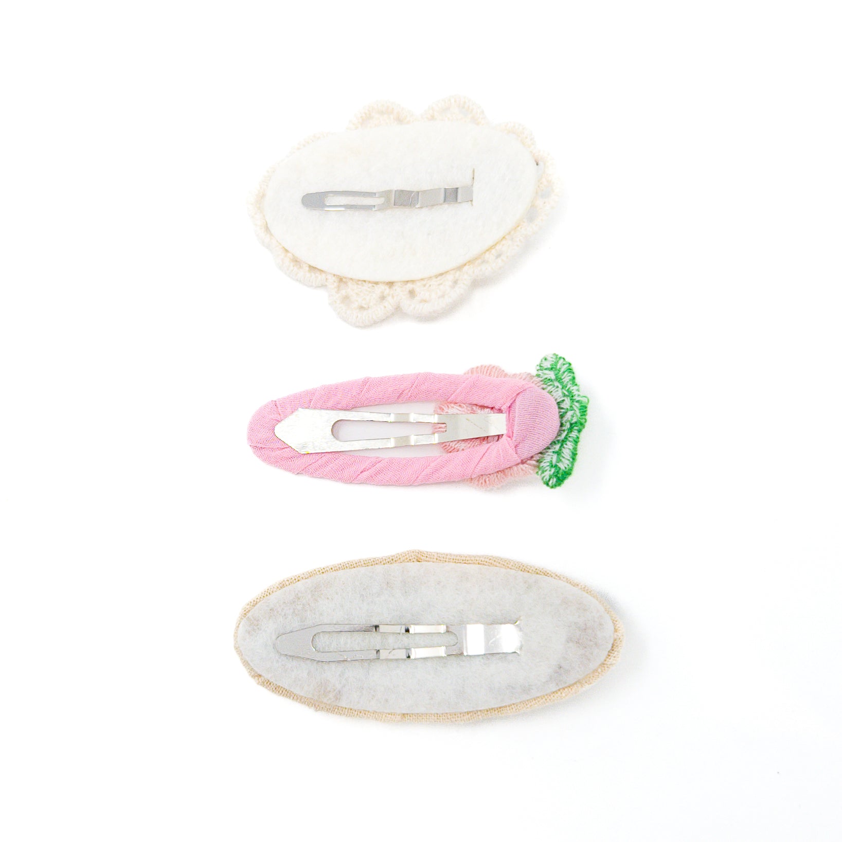 Three hair clips seen from the back.