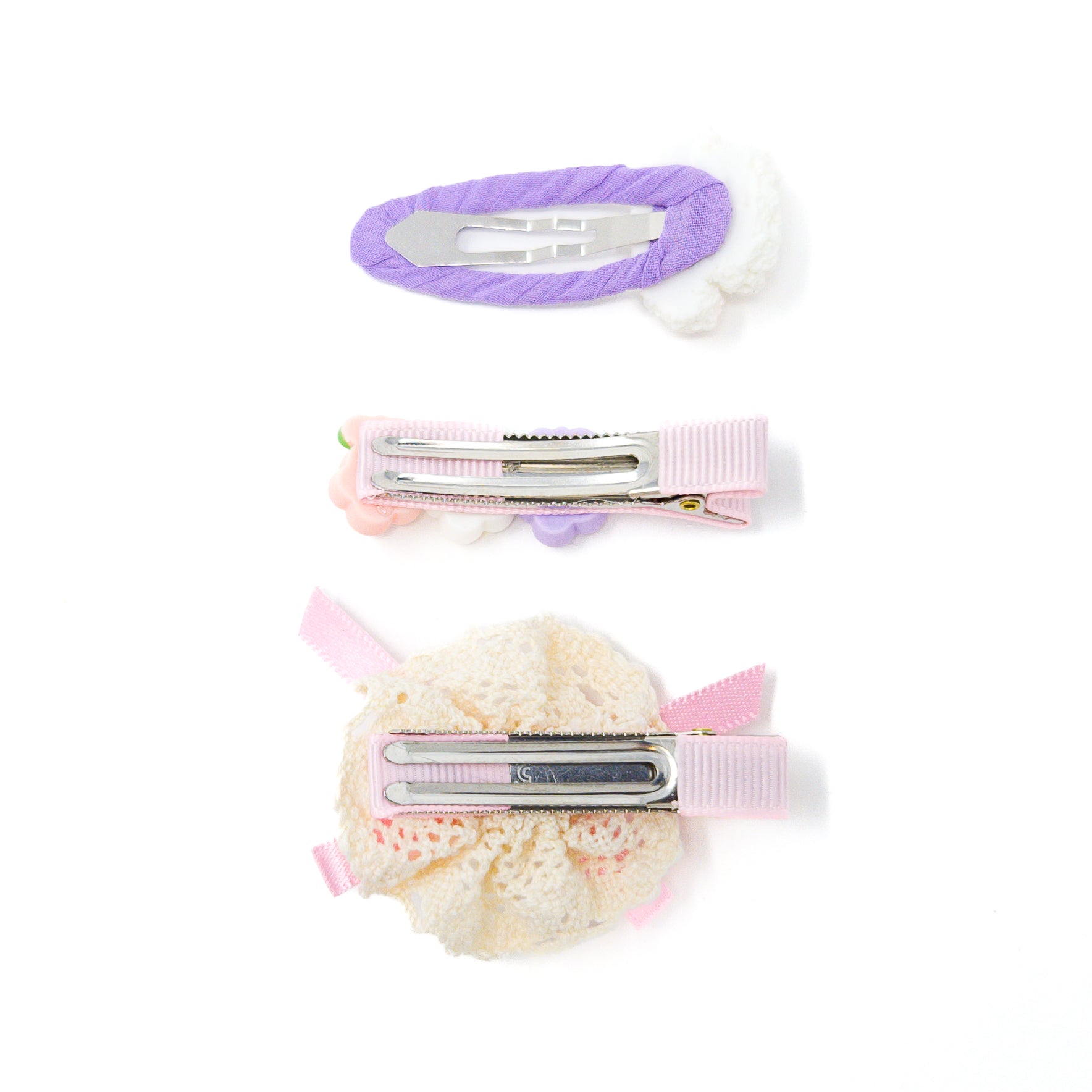 Three hair clips on a white background.