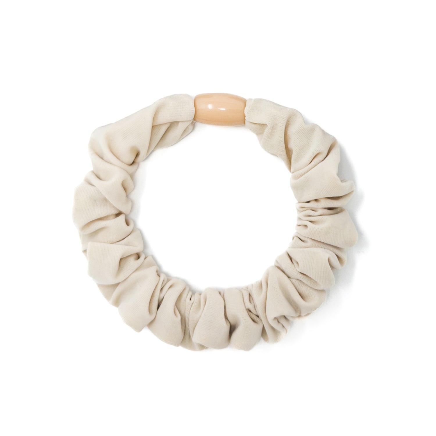 Beige fabric hair tie with wooden toggle.