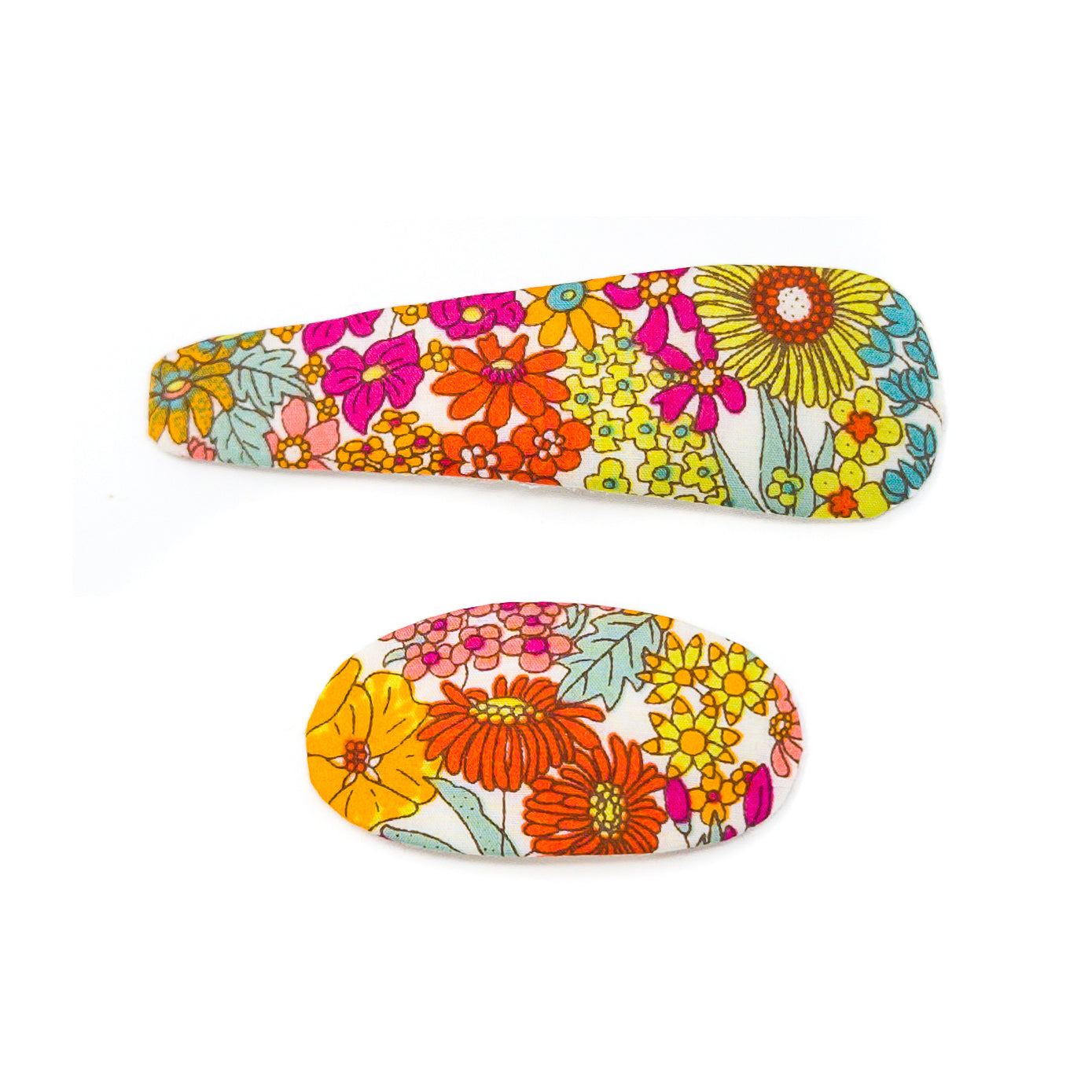 Two floral hair clips on a white background.