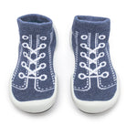 Pair of blue knitted sock shoes with white soles and lace pattern.