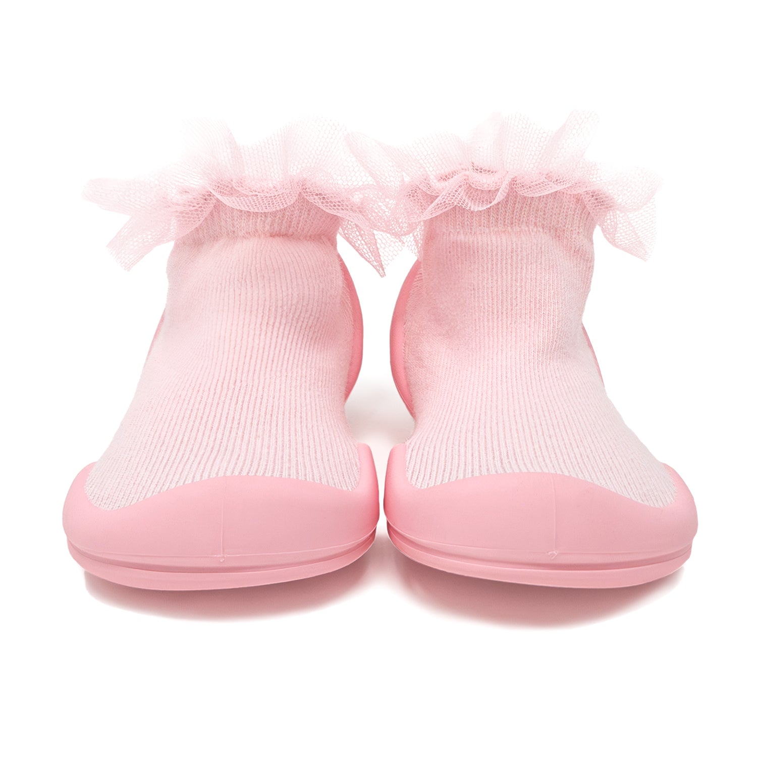 Pink sock shoes with frilly tulle trim.