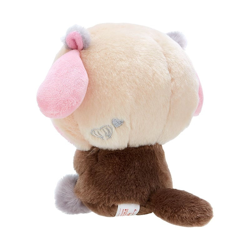 Stuffed animal toy, tan and brown, pink ears, gray accents.