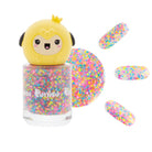 Close-up of a bottle of glitter nail polish with a yellow cartoon chick figurine as the cap.