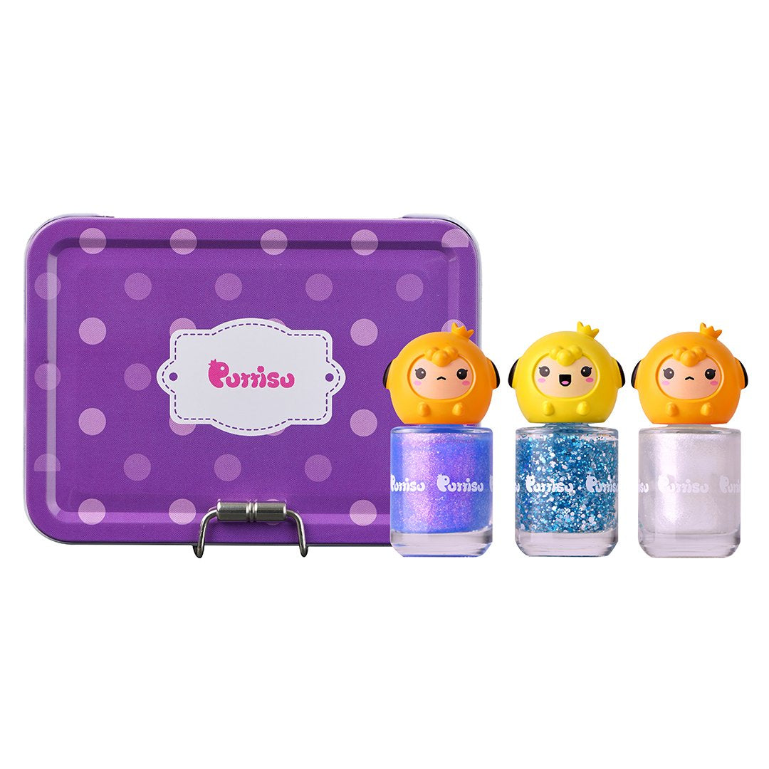 A purple polka-dot tin box sits next to three bottles of glitter nail polish with cartoon bird figures on top.