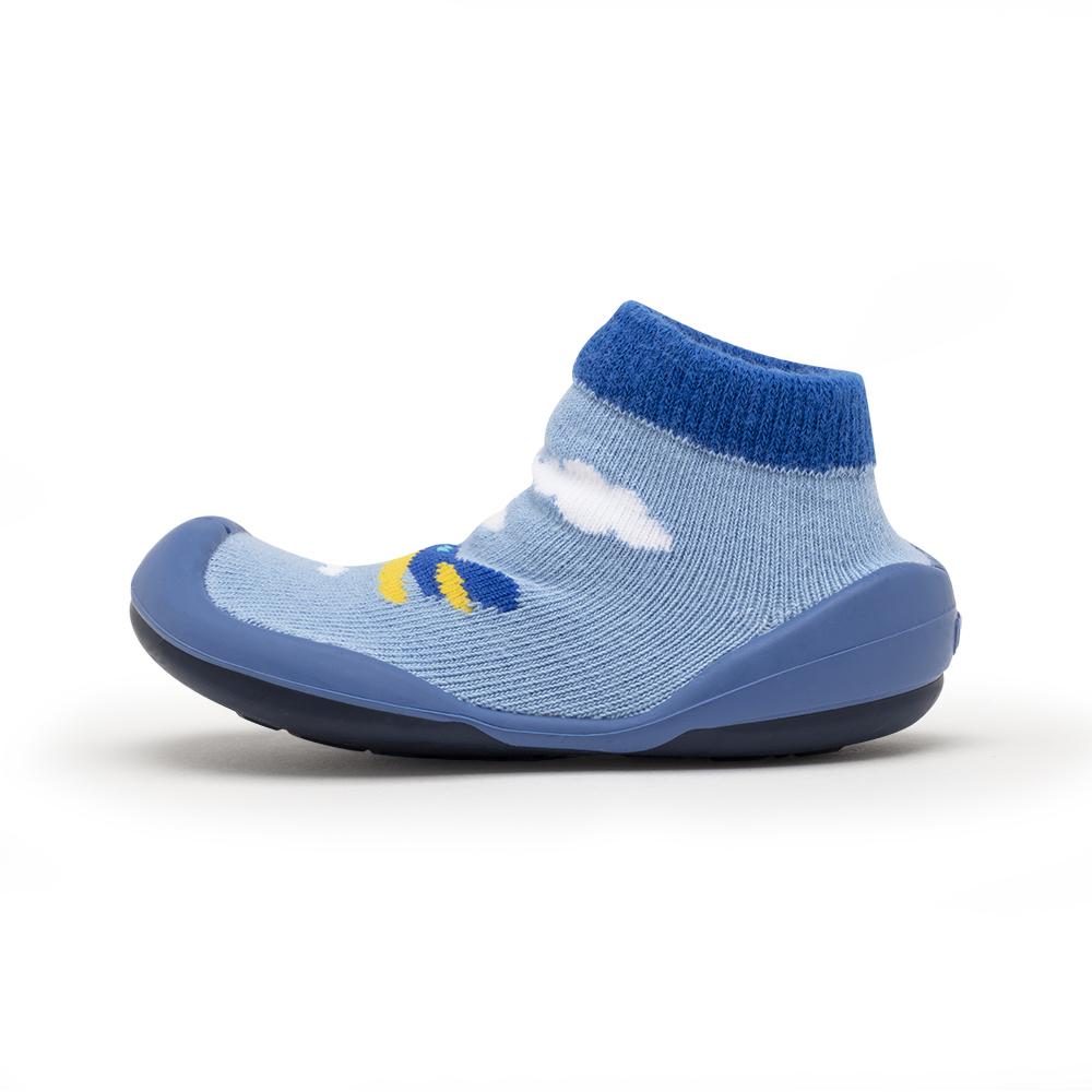 Blue baby sock-shoe with airplane graphic.