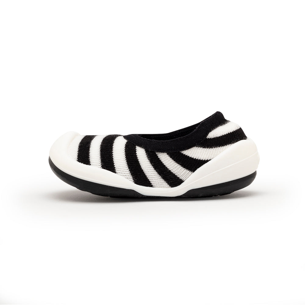 Black and white striped slipper shoe.