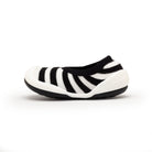 Black and white striped slipper shoe.