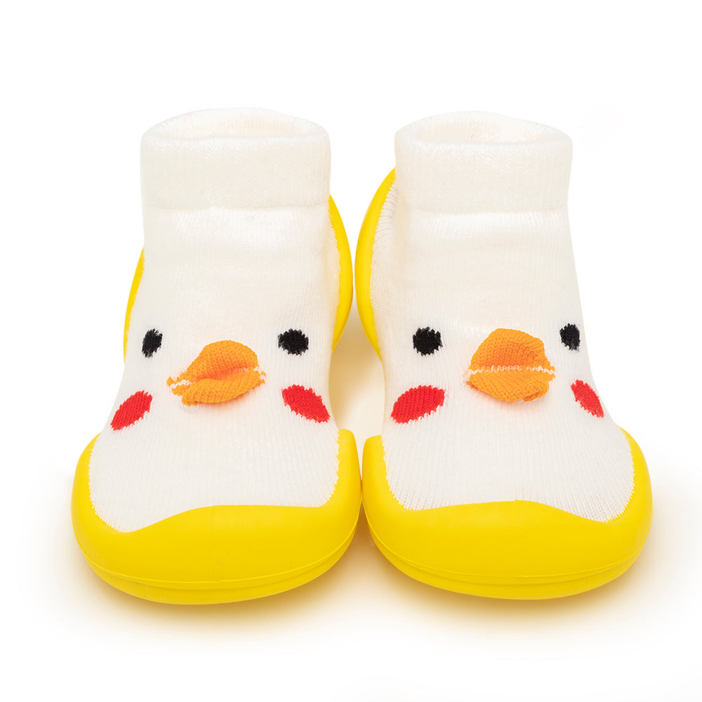Pair of yellow and white baby socks with chick design.