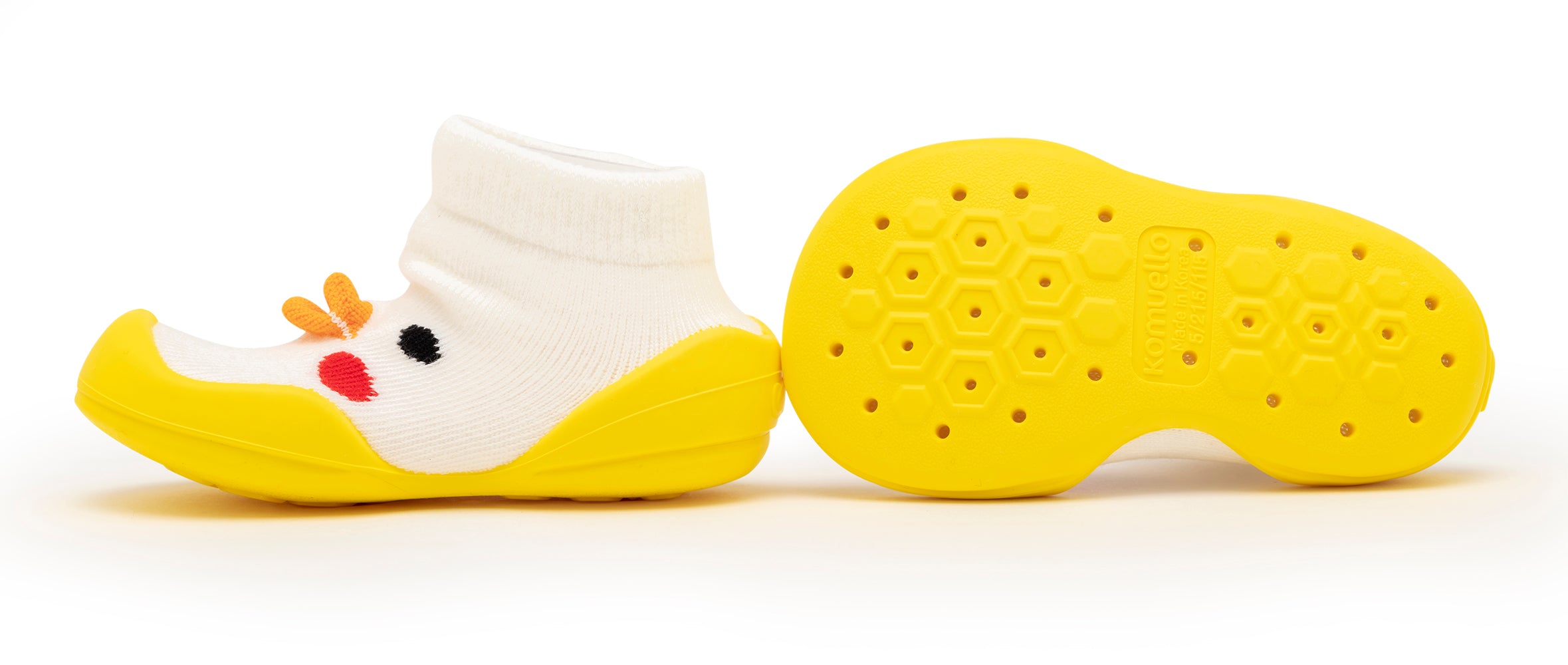 Pair of yellow and white sock-shoes.