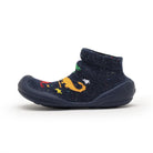 Navy blue baby shoe-sock with colorful dinosaur design.