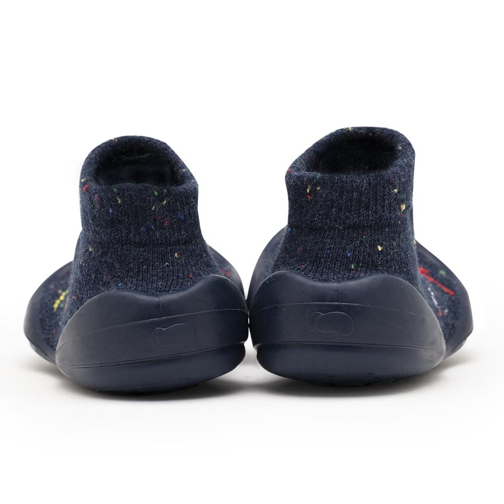 Two navy blue baby shoes.