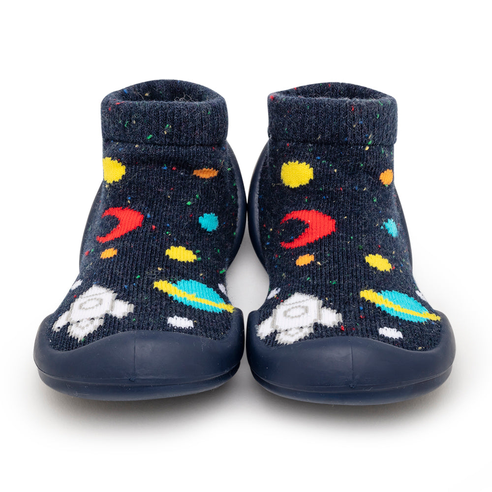 Two space-themed baby shoes.