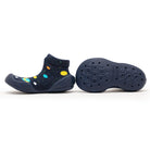 Two blue sock-shoes, one with colorful dots. One sole showing.