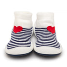 Pair of baby sock shoes with stripes and red hearts.