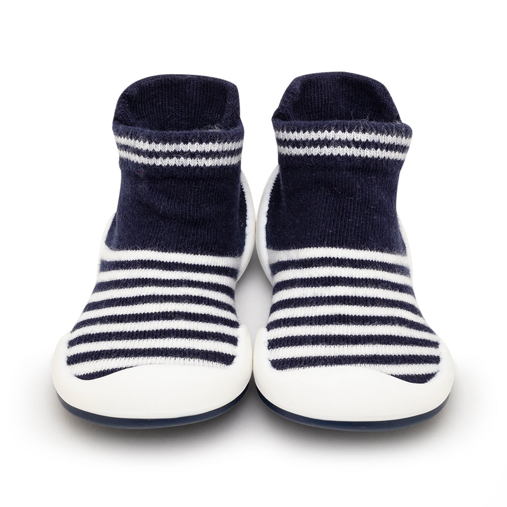 Pair of striped baby sock shoes.