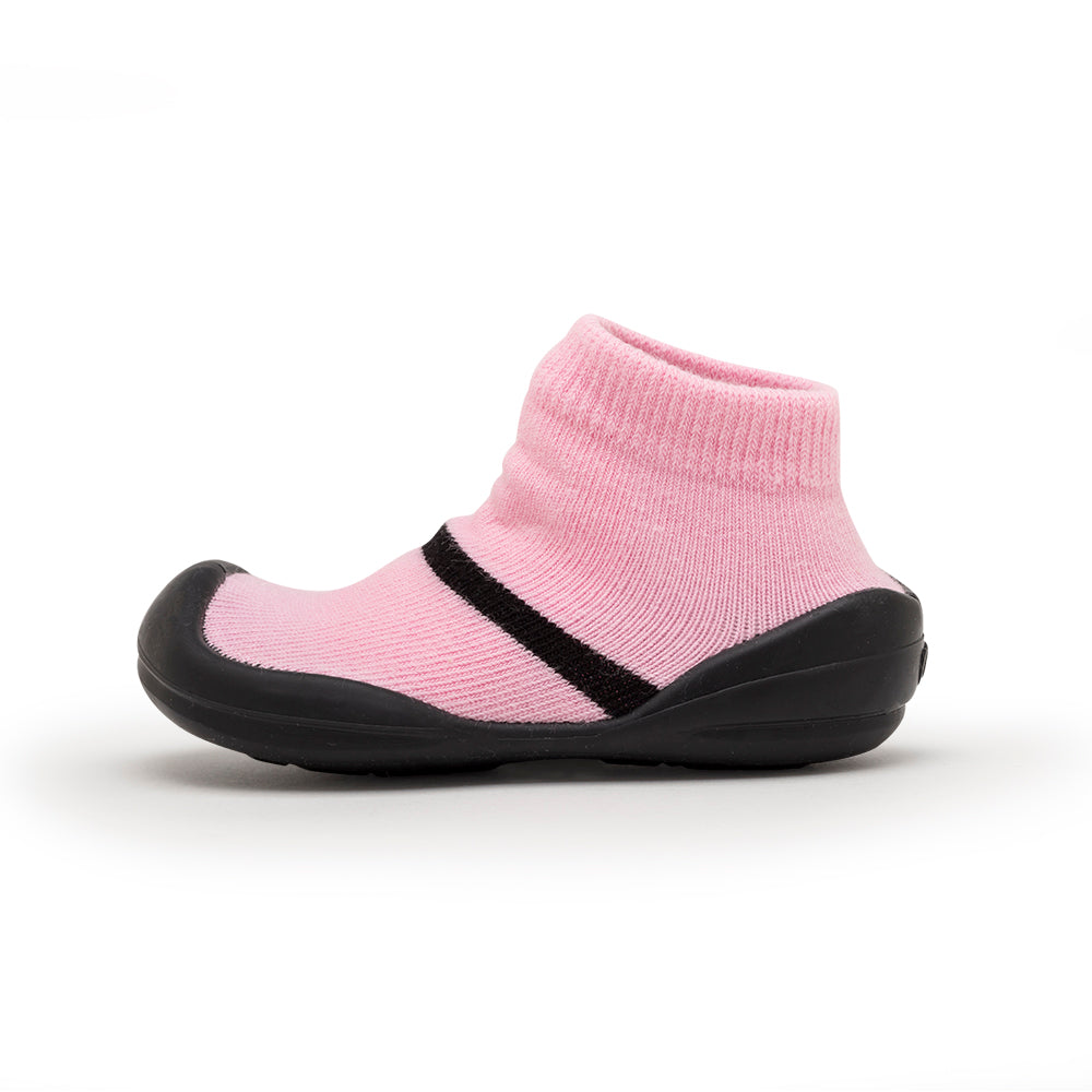 Pink sock-shoe with black sole.