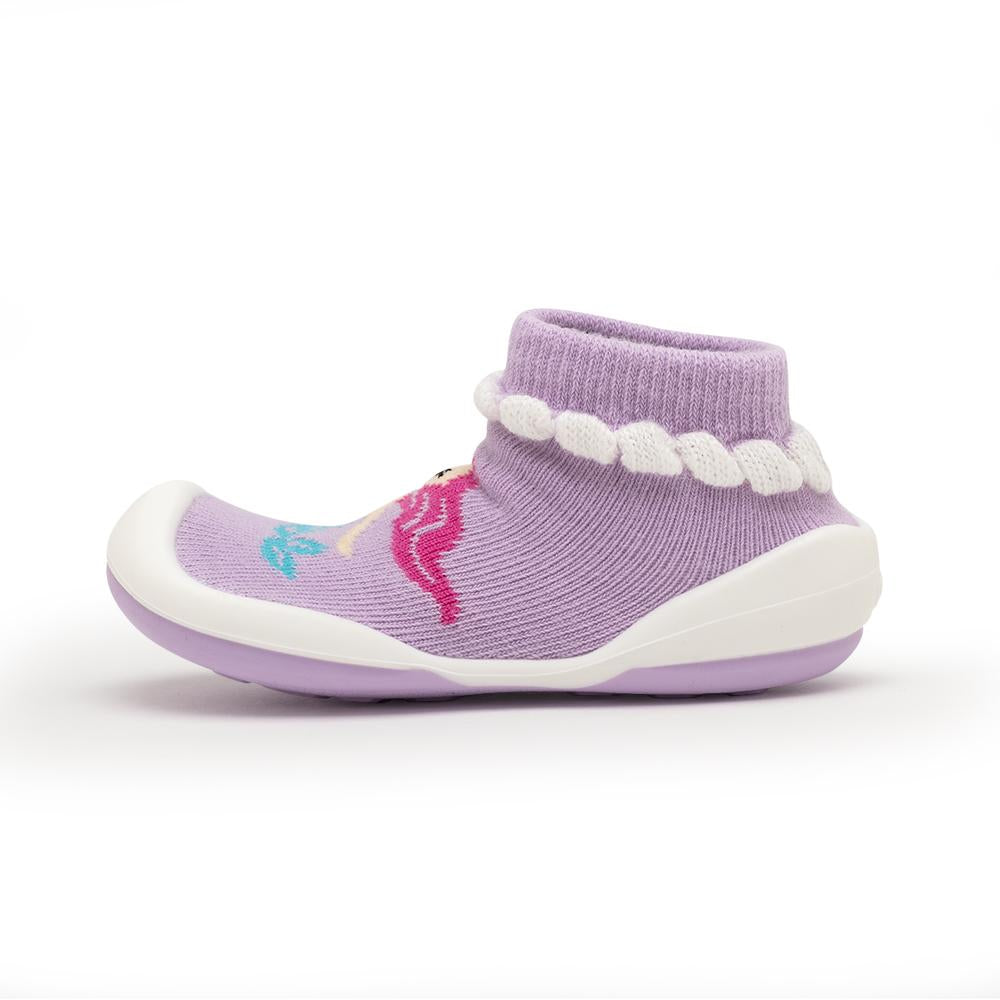 Lilac sock-like shoe with white sole and ruffle trim.