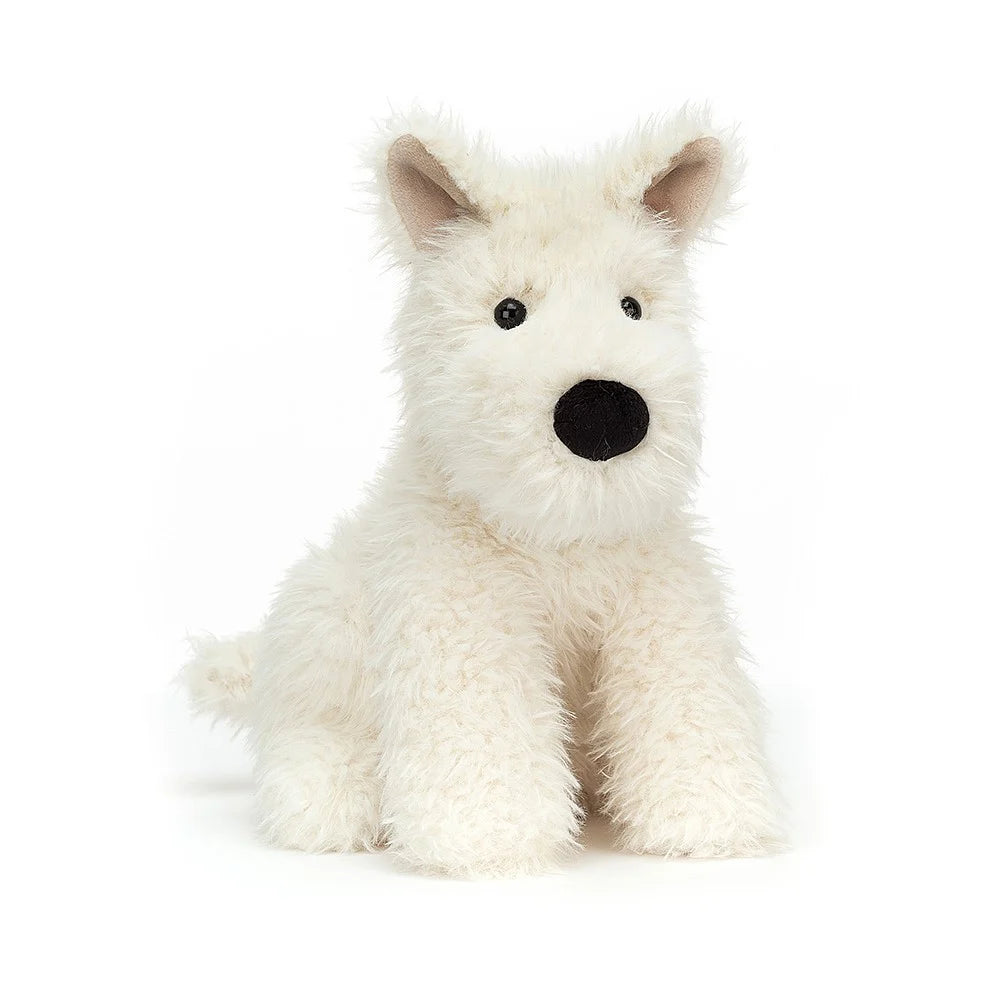 Stuffed white West Highland Terrier toy.