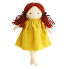 Cloth doll with red yarn hair, yellow dress, and black ribbons.