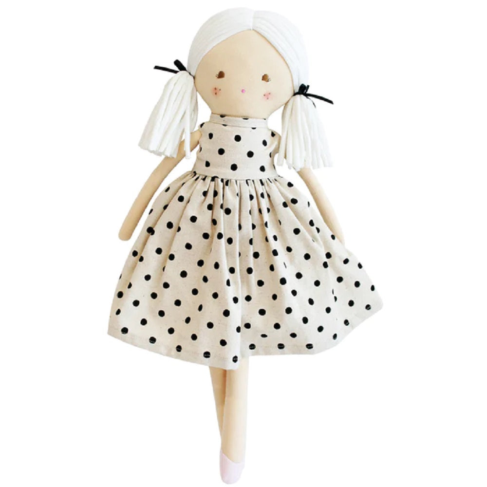 Stuffed doll with white hair, pigtails, and polka dot dress.